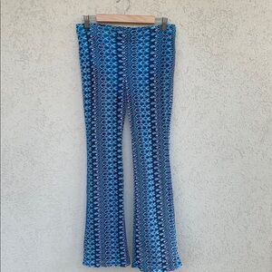 DIVIDED Blue and white psychedelic sheer flare Pants. Built in underwear lining